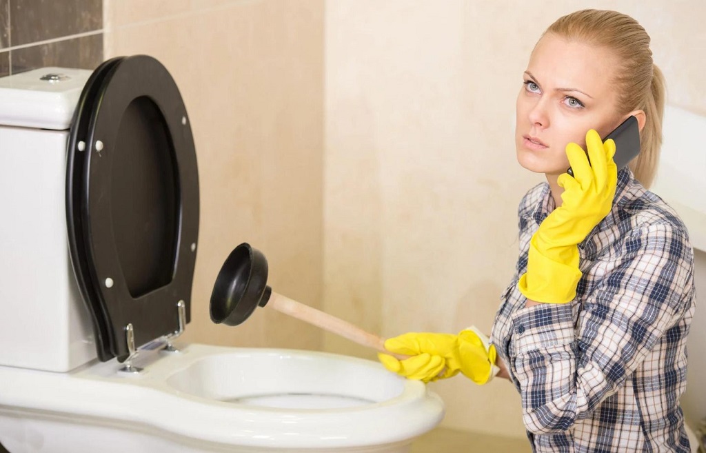 Call a professional for clear a sluggish toilet