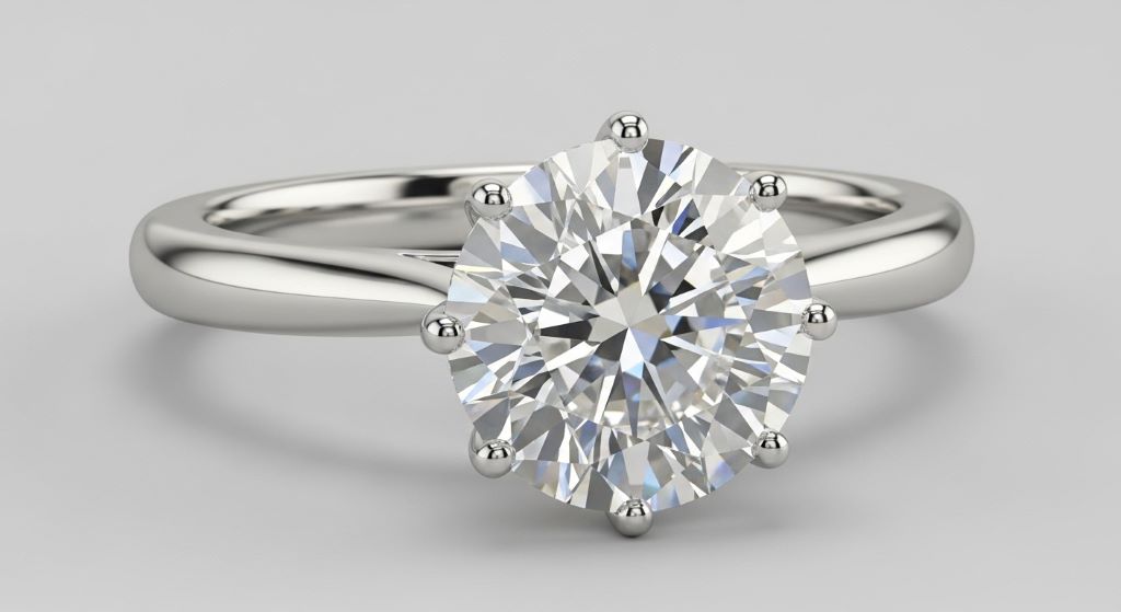 Brilliant moissanite engagement ring with sparkling center stone in white gold setting on neutral background